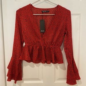 Red polka dot blouse